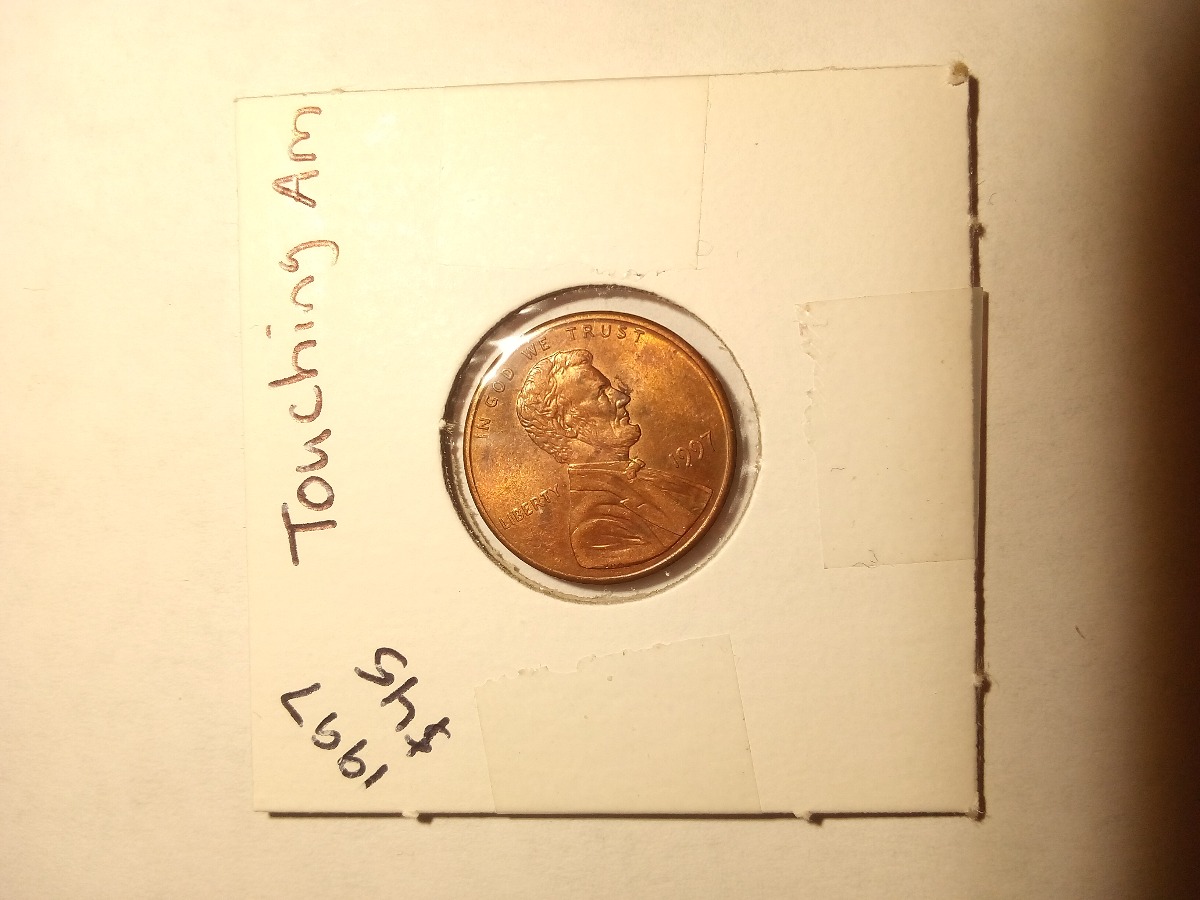 1997 touching AM penny collectible coin money