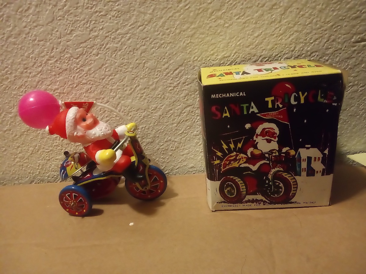 vintage mechanical santa tricycle wind up toy